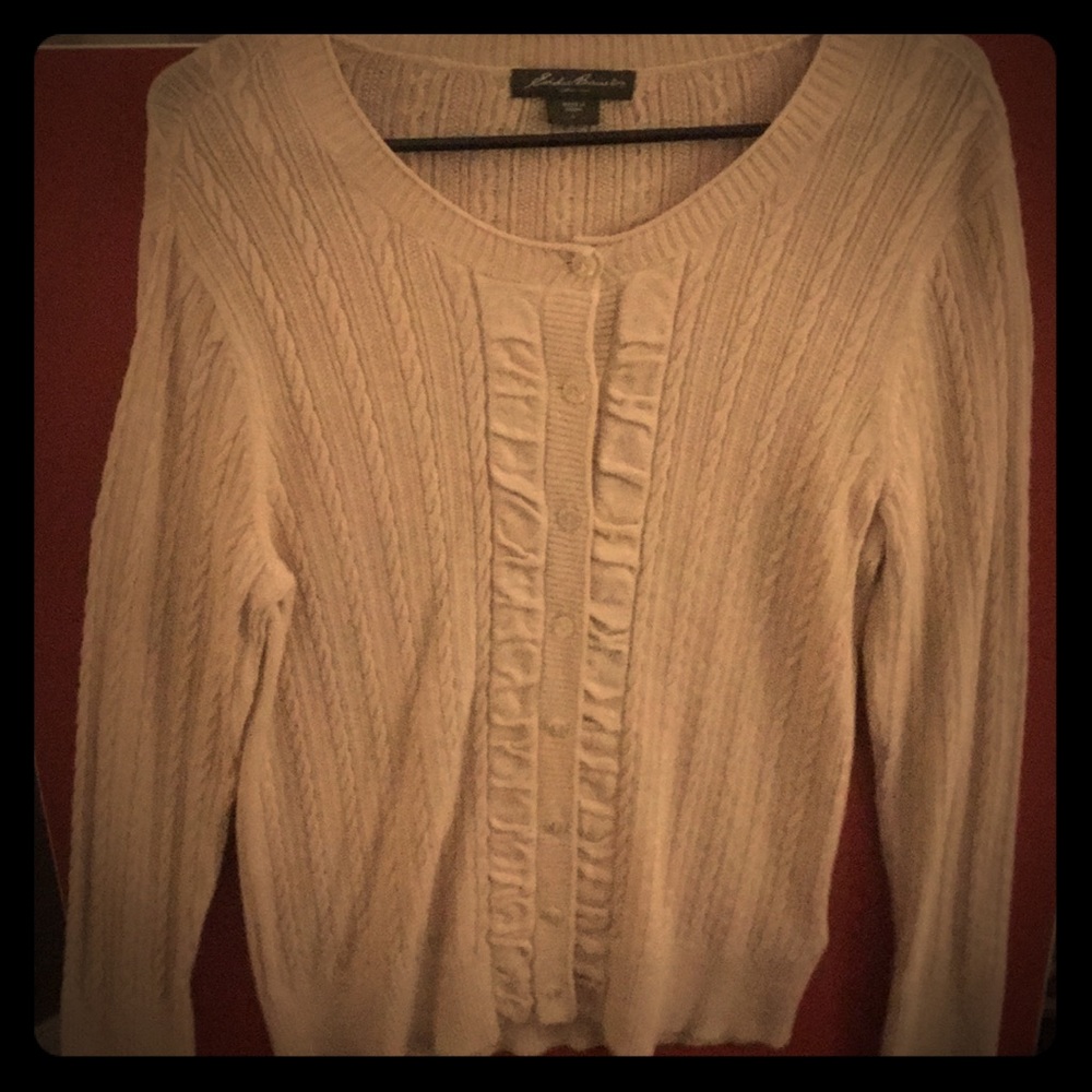 An Eddie Bauer cable knit button down sweater